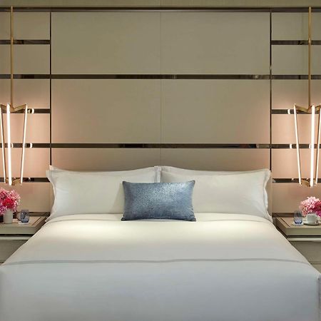 Crown Towers Sydney Hotell Exteriör bild A bedroom at The Ritz-Carlton, Dubai